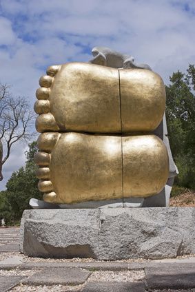 Gold Feet on Stone